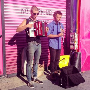 Musicians in front of Community Thrift Store